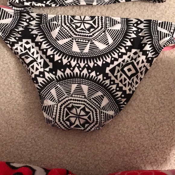 A black, white and coral bathing  suit - Picture 2 of 2